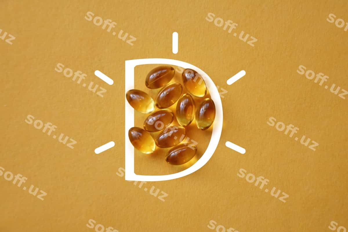 Vitamin D kapsullar sariq orqa fonda | Vitamin d capsules yellow background 1