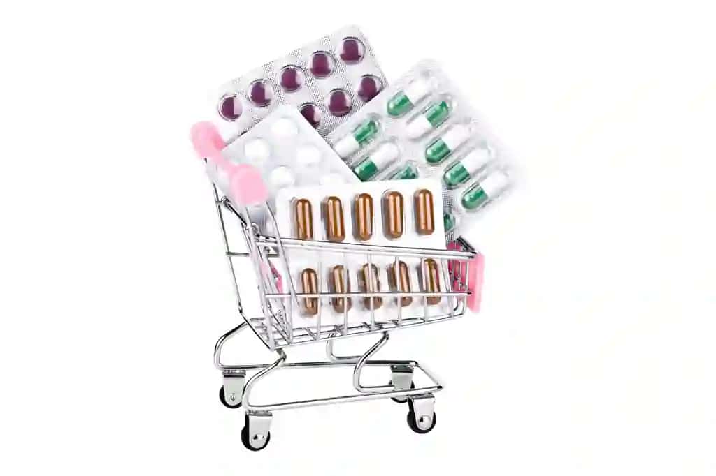 Supermarket karavaj tibbiy tabletka va kapsulalar ajralgan | Supermarket trolley medical pills capsules isolated