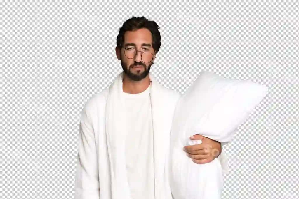 Yosh ajiq sochli ifodalovchi erkak bathroba va pilloga kiygan | Young crazy bearded expressive man wearing bathrobe pillow