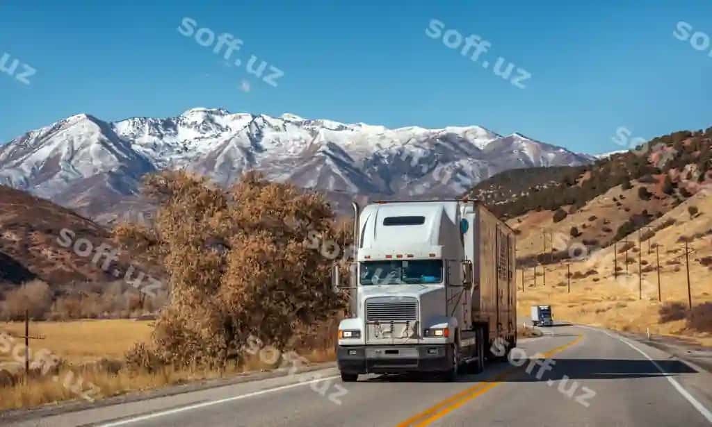 Aniq ko'k osmon orqali qor ba bilan bezatilgan minzollarining manzarmi. | Scenic view snowcapped mountains against clear blue sky