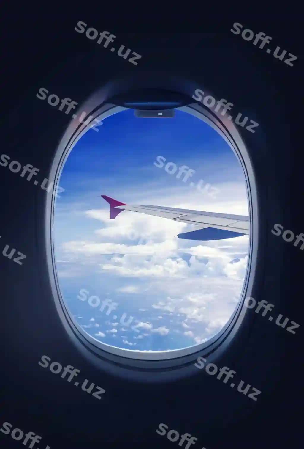 Samolyot oynasidagi bulutlar va osmon | Clouds sky looking through window airplane